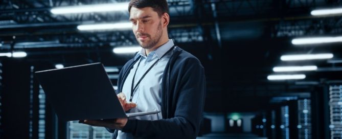 Data Center IT Specialist Using Laptop